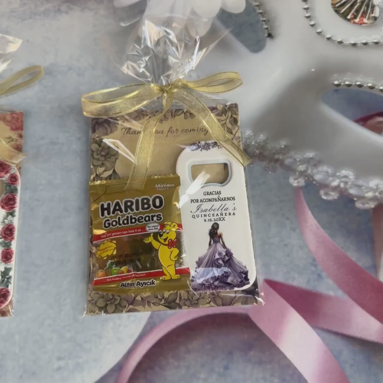 Quinceañera party gift pack including a personalized magnet, card, and gummy treats, perfect for celebrating your special occasion.